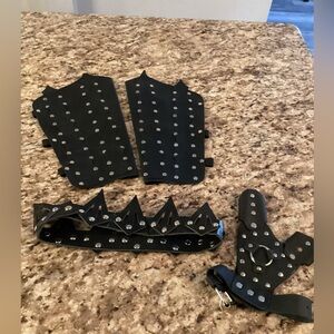 Medieval arm guards, hand guard, and crown